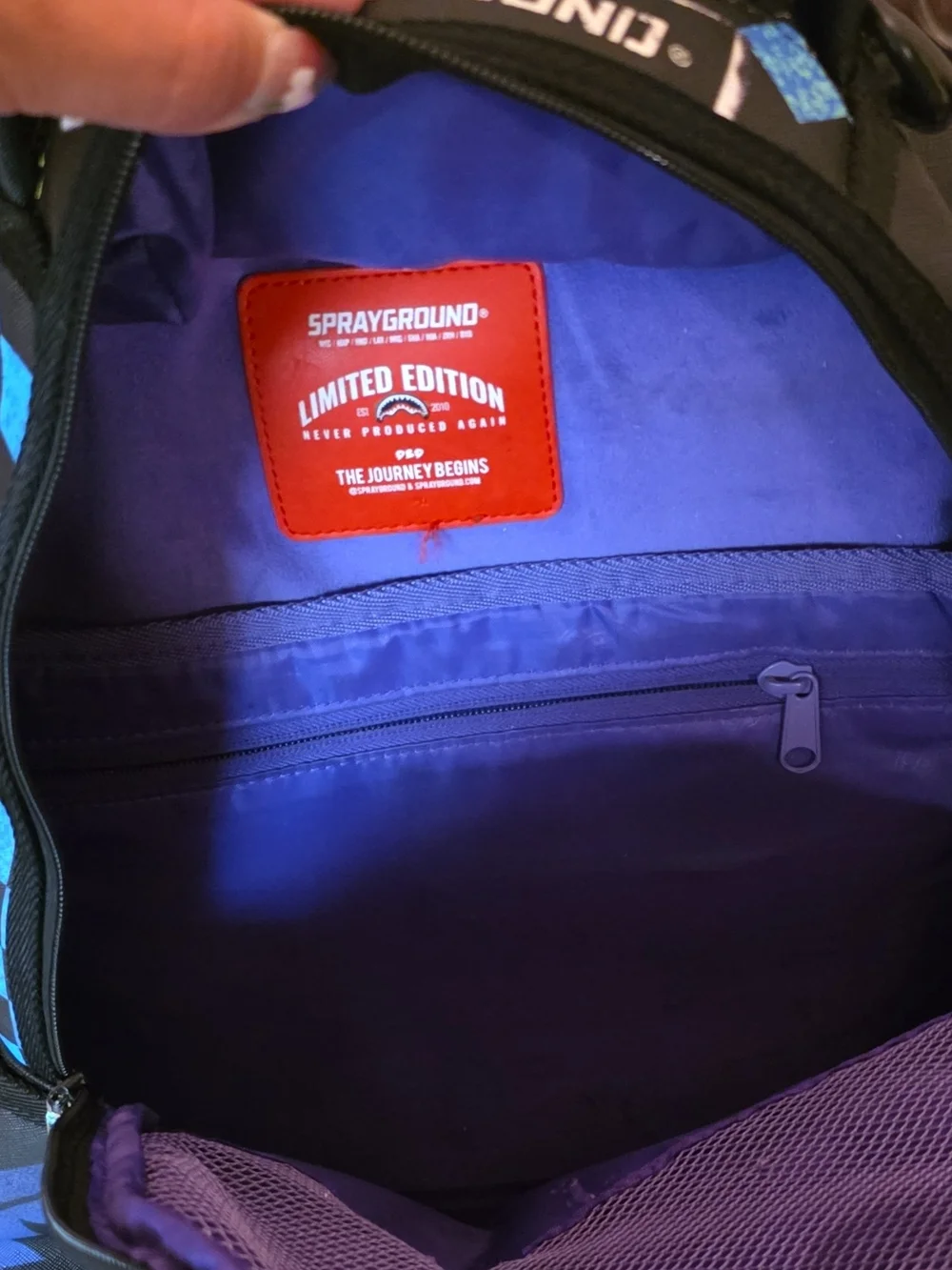 Sprayground Black Backpack with Blue, Purple & Green Graphic Shark Design